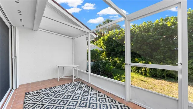 a bathroom with a shower curtain and a sink