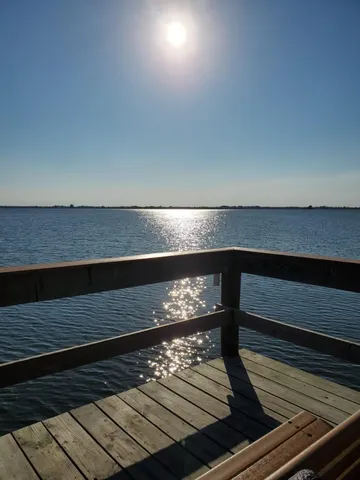 a view of a balcony with lake
