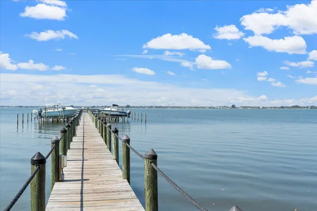 a view of balcony with wooden floor