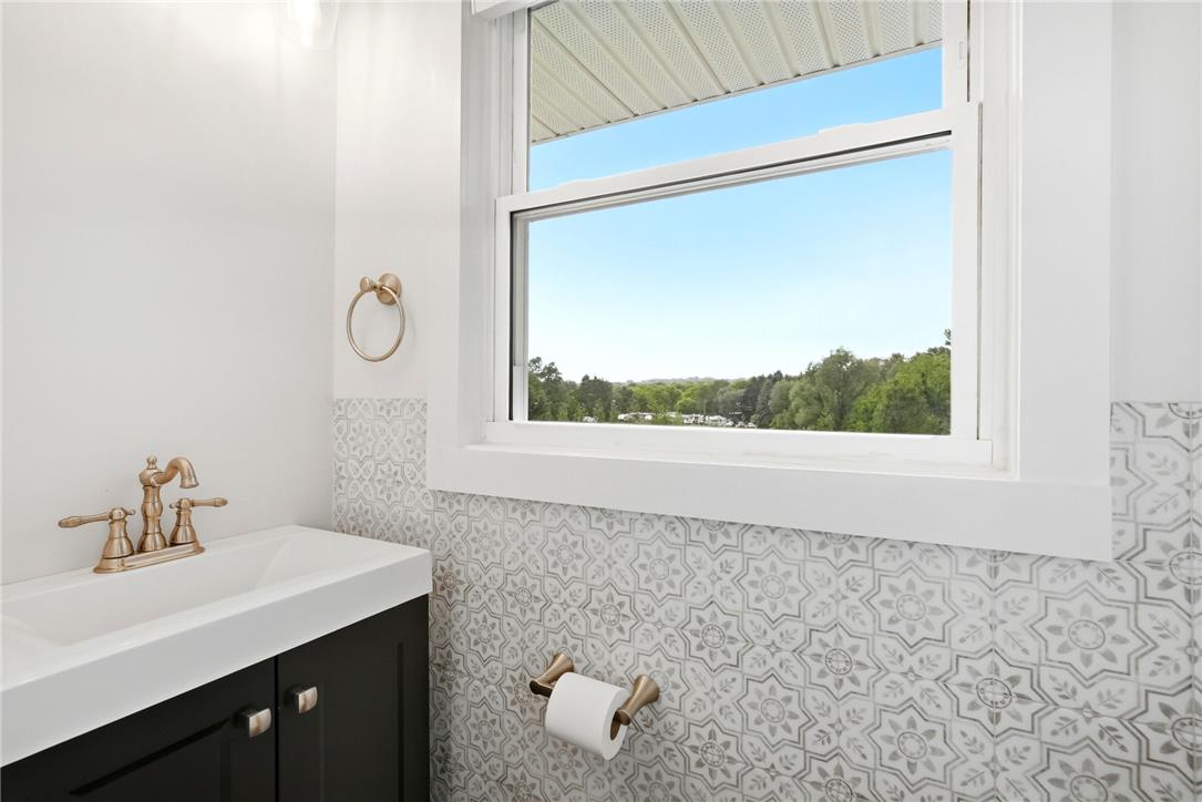 463 North Penn Dixie Road Bath, PA 18014 - Photo 35 of 86 A well-appointed bath features intricate patterned tile work and a window offering natural light.
