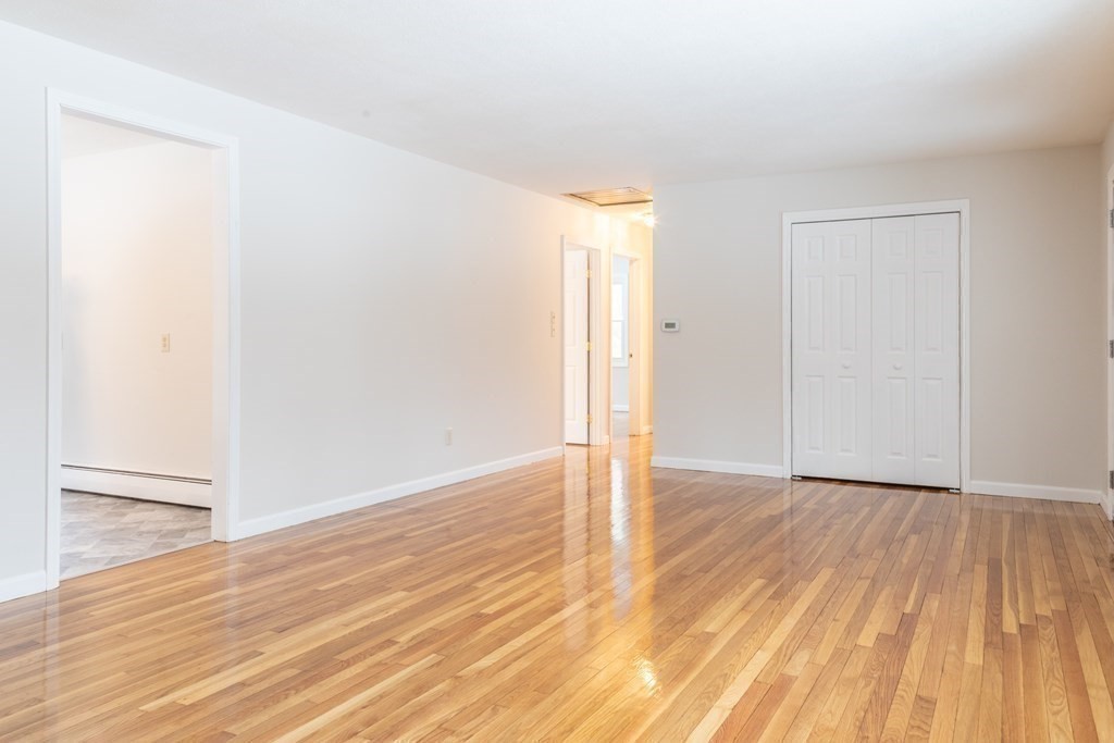 32 Paradise Lake Road Monson, MA 01057 - Photo 8 of 35 a view of an empty room with wooden floor