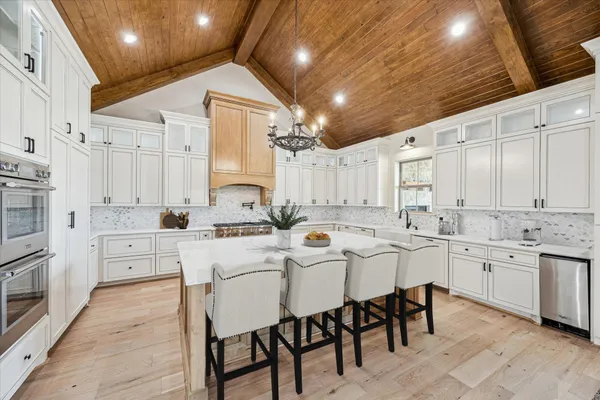 a bathroom with a bathtub and a sink