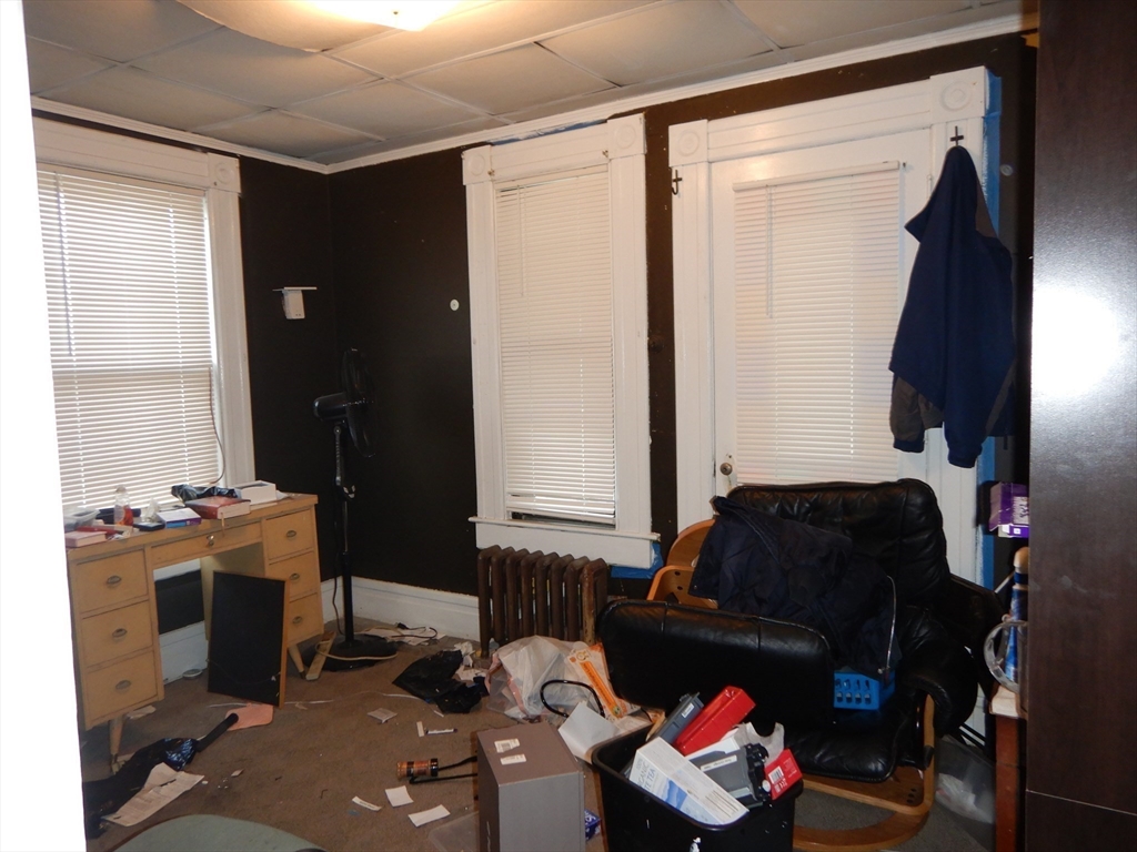 288 St James Avenue Springfield, MA 01109 - Photo 18 of 34 a living room with furniture and a window