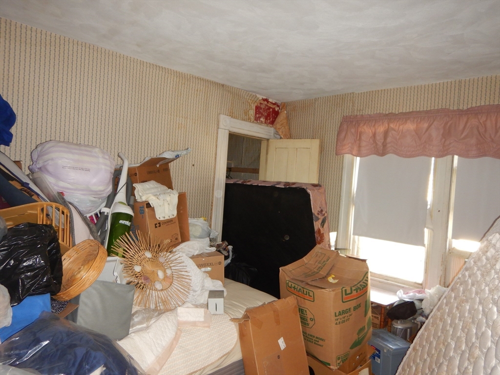 288 St James Avenue Springfield, MA 01109 - Photo 21 of 34 a living room with furniture and a fireplace