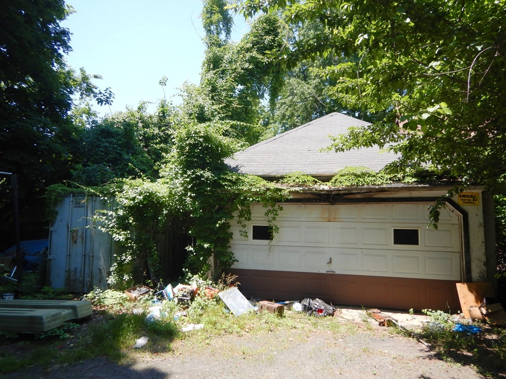 288 St James Avenue Springfield, MA 01109 - Photo 6 of 34 a front view of a house with a yard