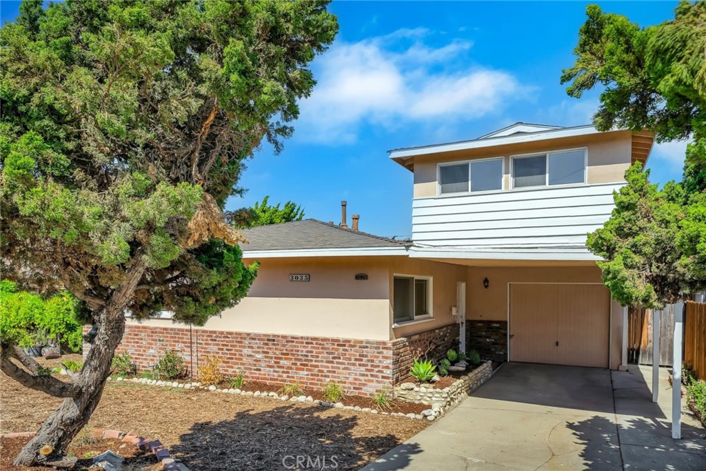 3035 Winlock Road Torrance, CA 90505 - Photo 1 of 1 a front view of a house with a yard