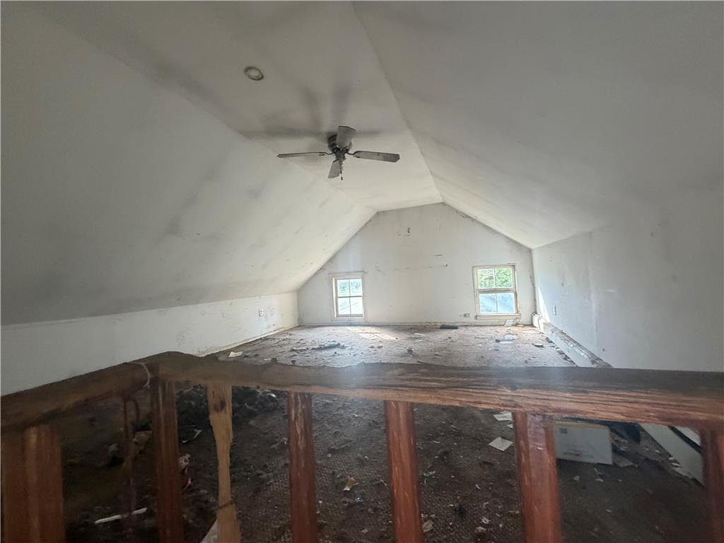 8745 Ashfield Road Slatington, PA 18080 - Photo 10 of 17 An upper loft space features vaulted ceilings and two rear windows.