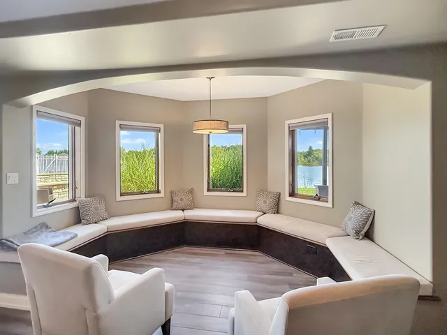 a kitchen with stainless steel appliances granite countertop a sink and a stove