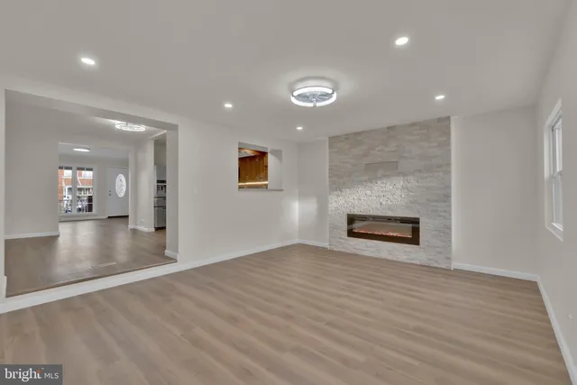 a view of a livingroom with wooden floor
