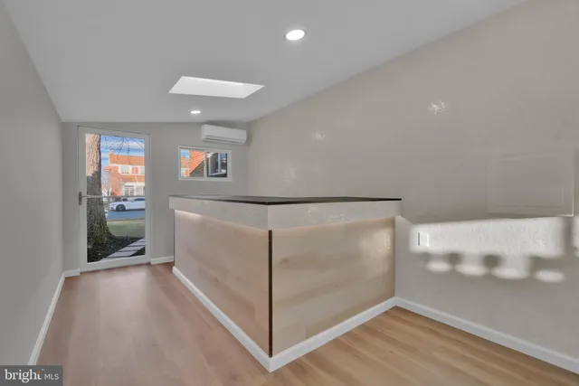 a view of entryway with wooden floor