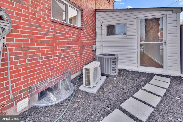 a bathroom with a toilet and a sink