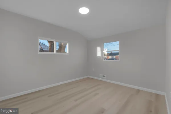 an empty room with a workbench