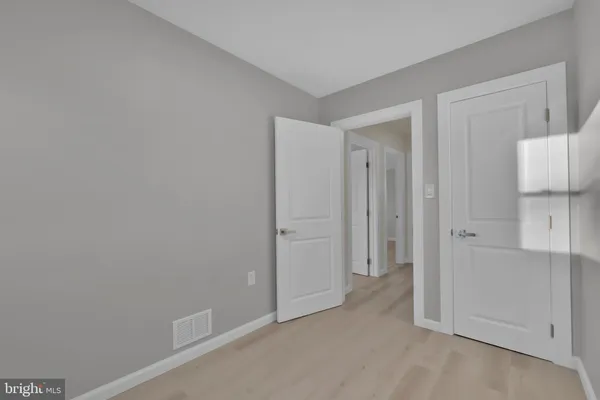 a view of a house with a tree