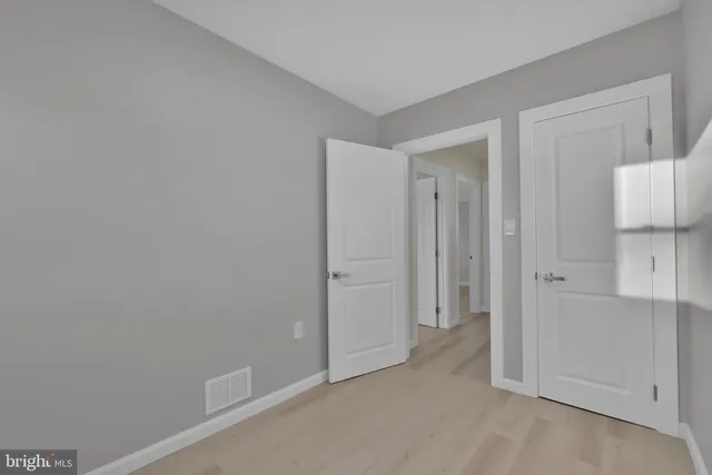 a view of a house with a tree