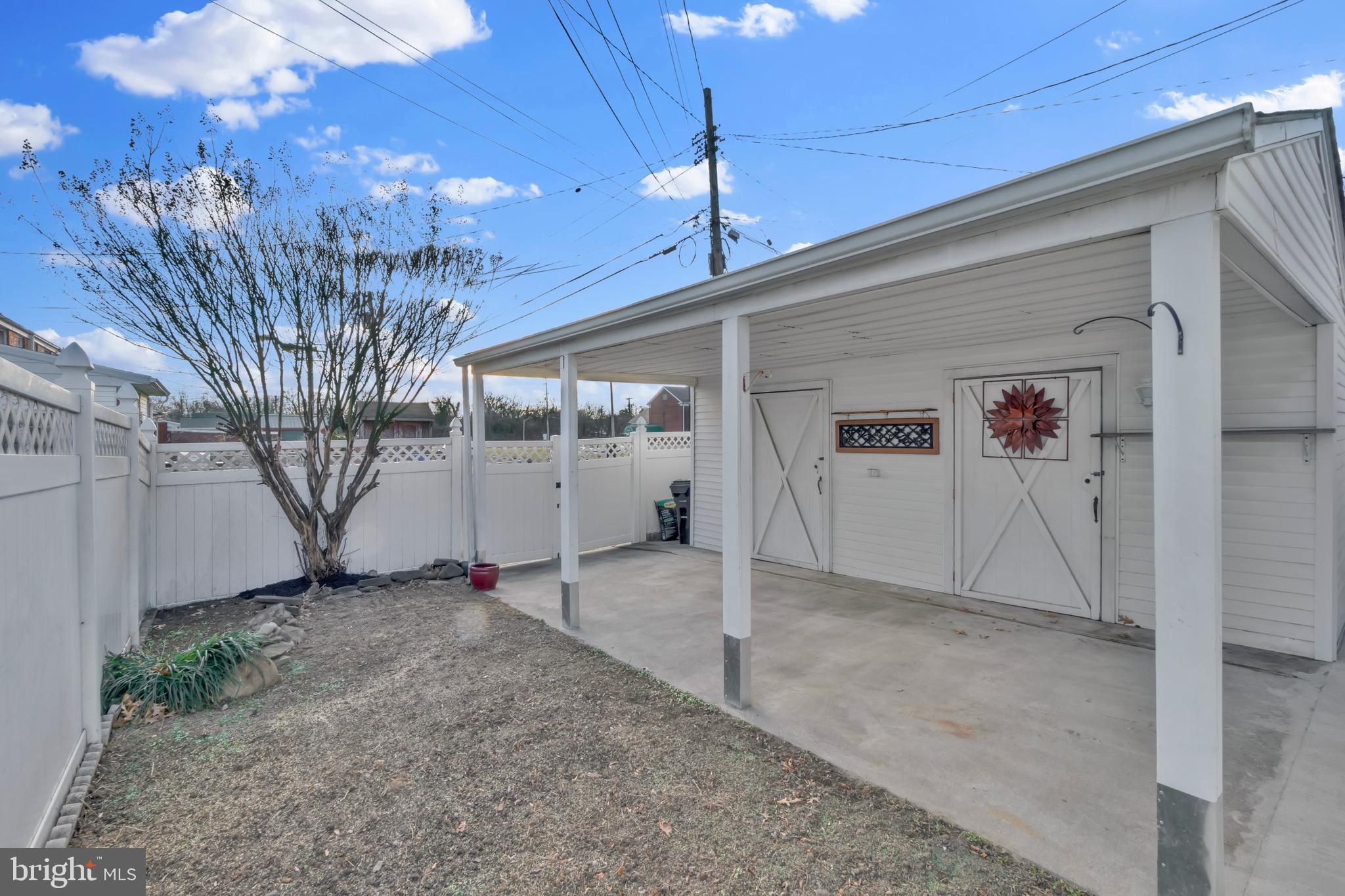 2725 Kirkleigh Road Baltimore, MD 21222 - Photo 46 of 50 Rear Yard with Carport or Covered Patio