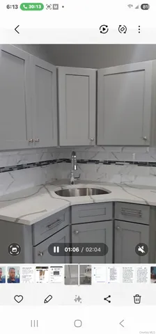 a bathroom with a sink and mirror