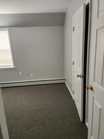 an empty room with a door