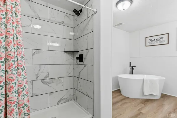 a bathroom with a sink and bathtub