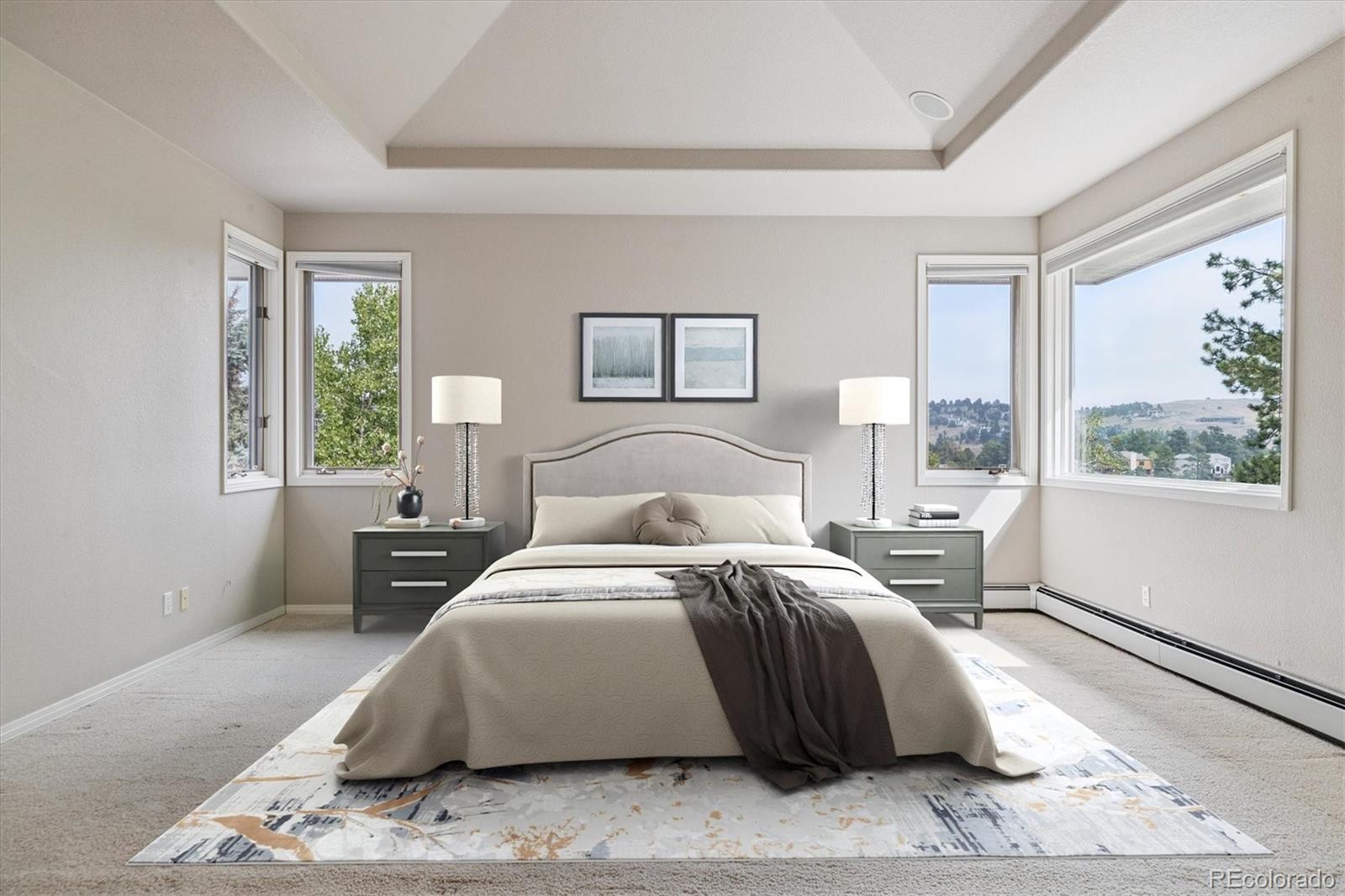 981 Sleepy Hollow Road Golden, CO 80401 - Photo 20 of 50 a bedroom with a bed and wooden floor