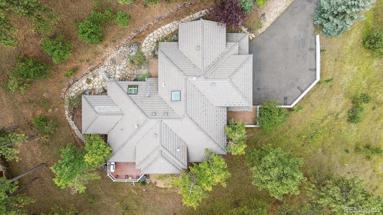 981 Sleepy Hollow Road Golden, CO 80401 - Photo 43 of 50 an aerial view of residential house with outdoor space and trees all around