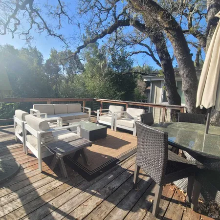a view of a roof deck with couches