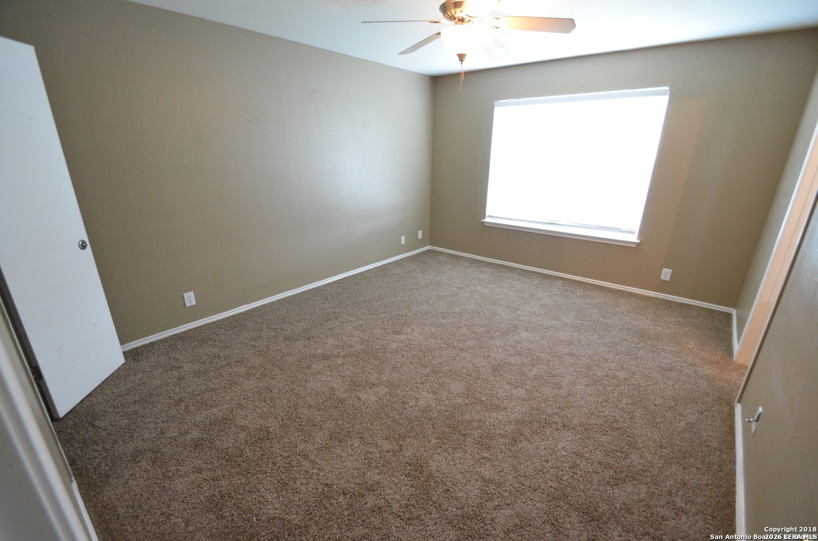 9139 Laguna Selma, TX 78154 - Photo 5 of 10 an empty room with a window