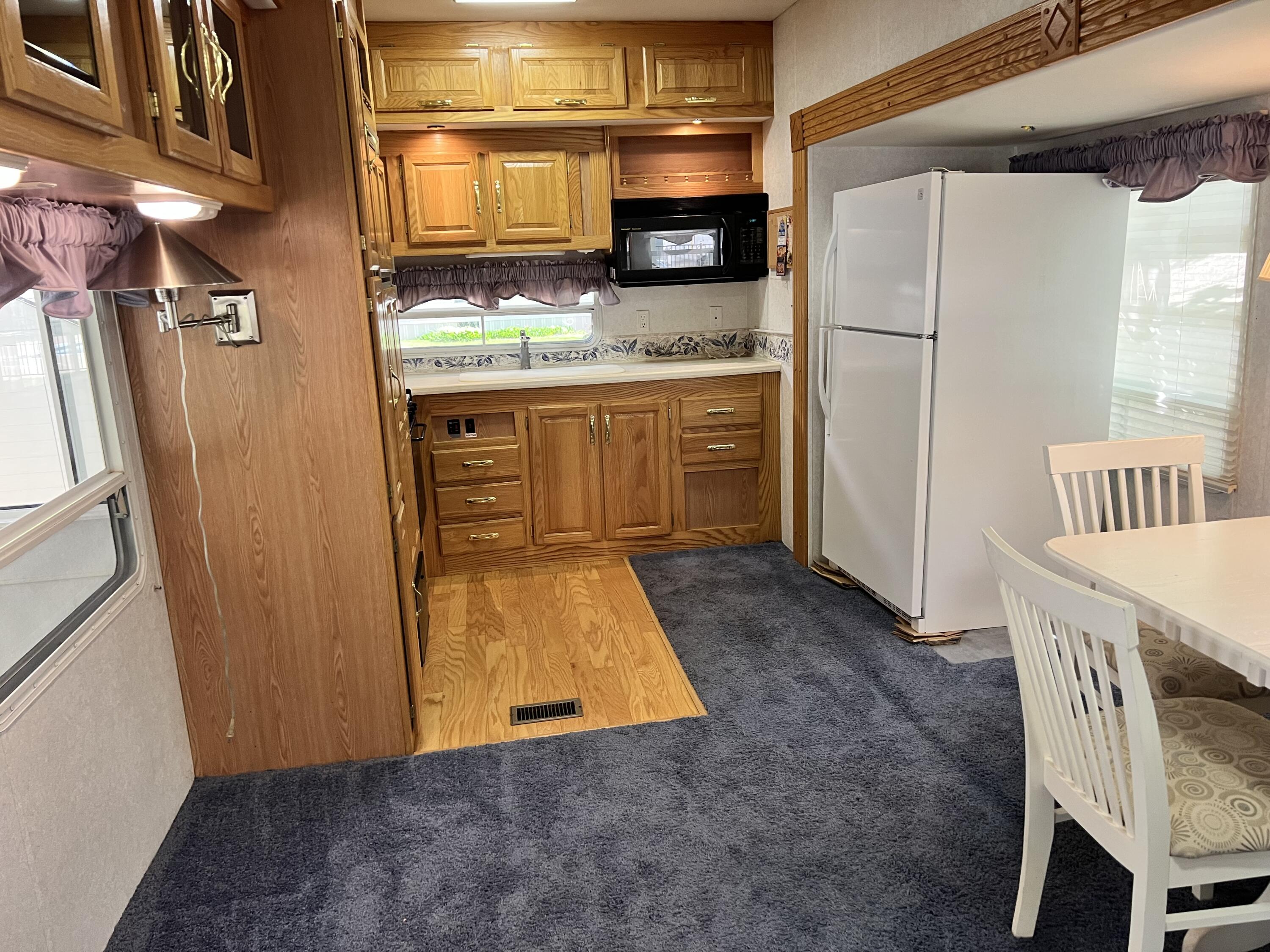 10020 Musson Road, Unit 155 Six Lakes, MI 48886 - Photo 3 of 54 IMG_5033