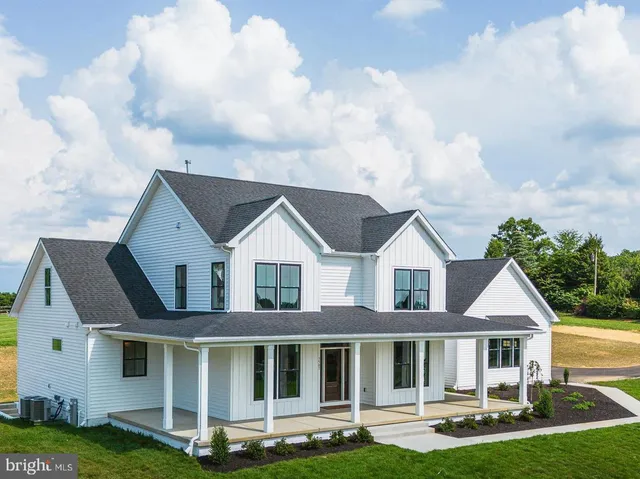 a room with gym equipment and a table