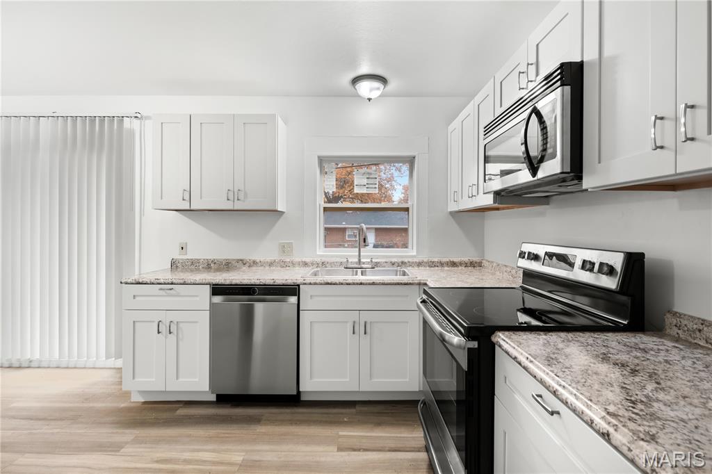 11795 Old Halls Ferry Road Florissant, MO 63033 - Photo 3 of 28