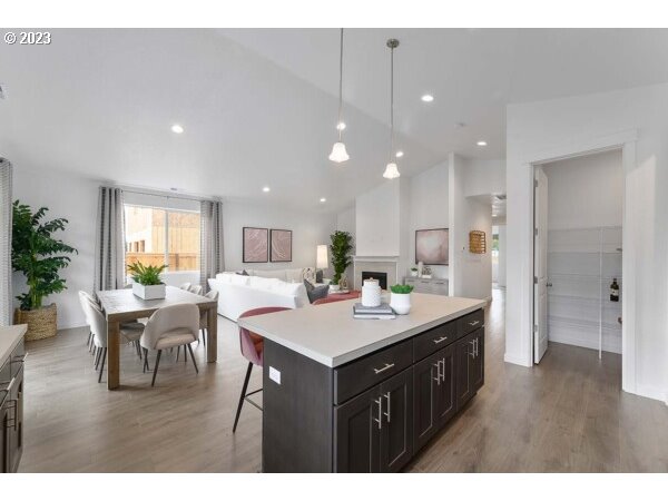 313 West 19th Street Lafayette, OR 97127 - Photo 4 of 18 a kitchen with a table and chairs