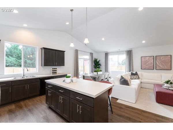 313 West 19th Street Lafayette, OR 97127 - Photo 5 of 18 a large kitchen with a sink and cabinets