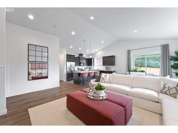 313 West 19th Street Lafayette, OR 97127 - Photo 7 of 18 a living room with furniture and kitchen view
