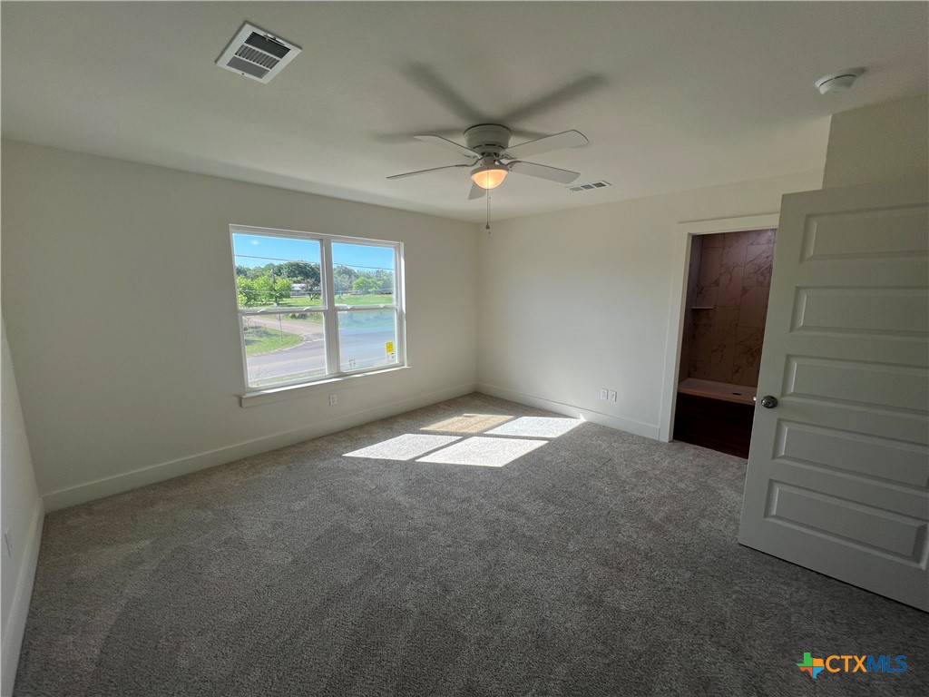 1822 Royal Loop Belton, TX 76513 - Photo 18 of 22 an empty room with windows and closet