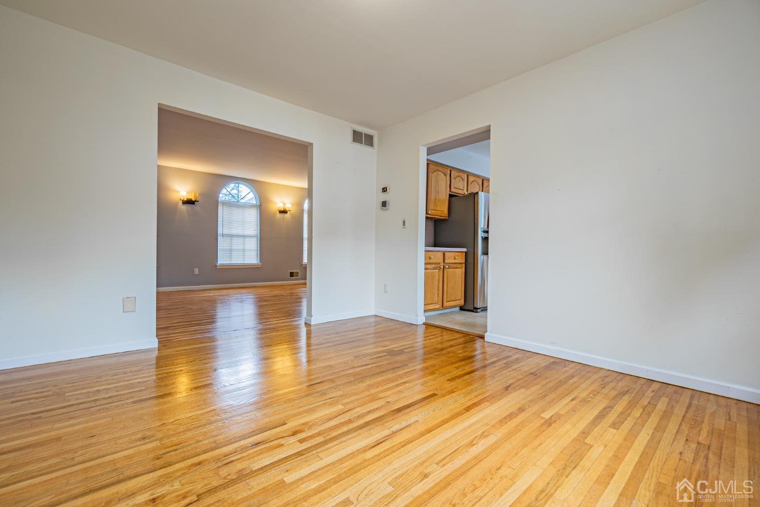 6 Sarah Court Edison, NJ 08817 - Photo 12 of 34 a view of empty room with wooden floor