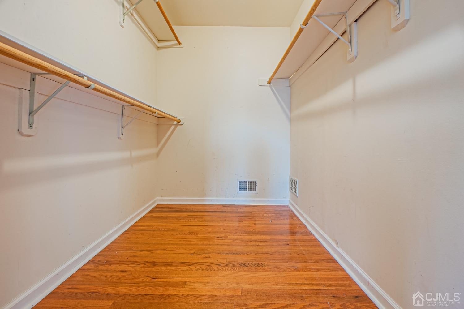 6 Sarah Court Edison, NJ 08817 - Photo 14 of 34 a view of a room with racks on the wall