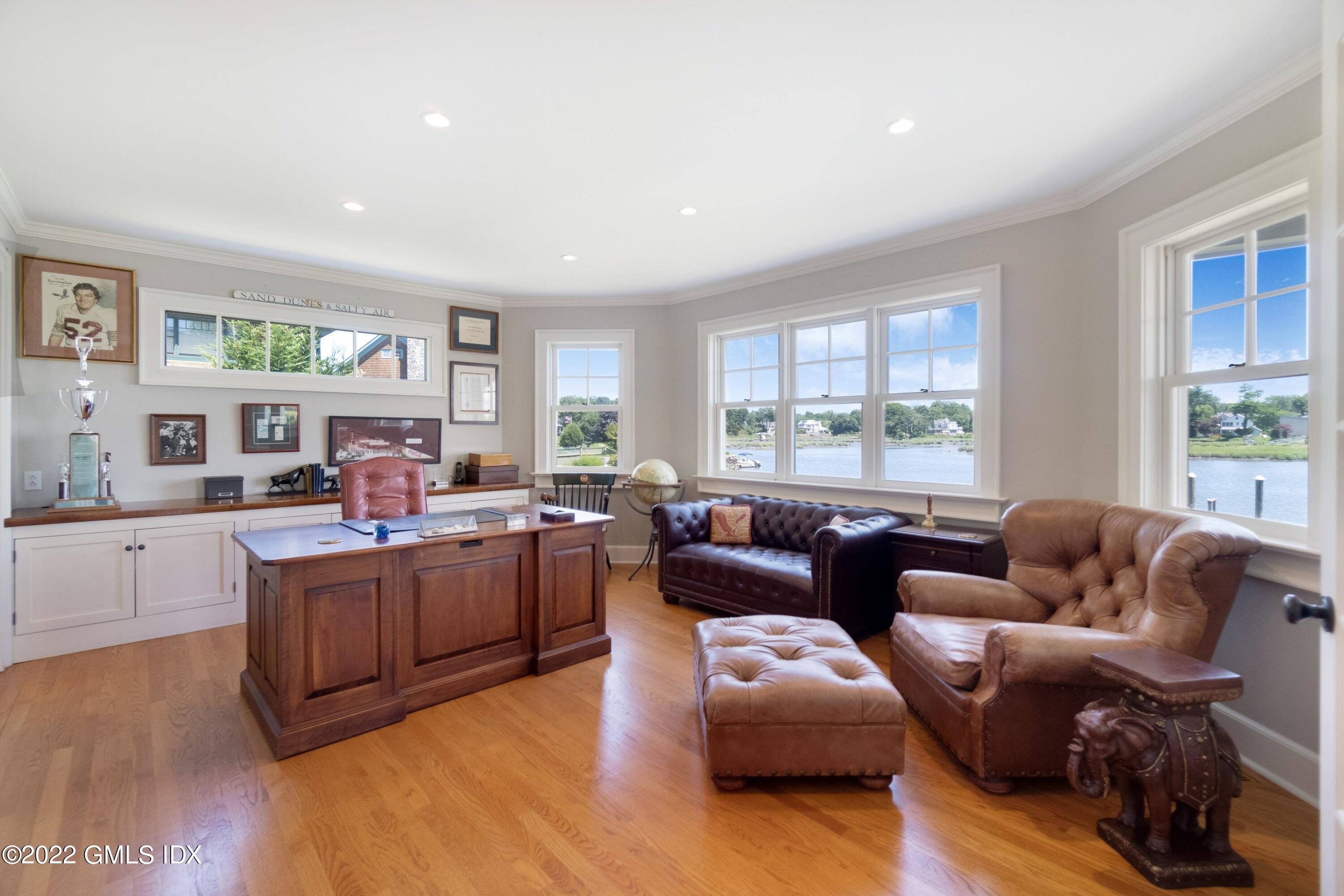 27 Willowmere Circle Riverside, CT 06878 - Photo 12 of 33 a living room with furniture and windows