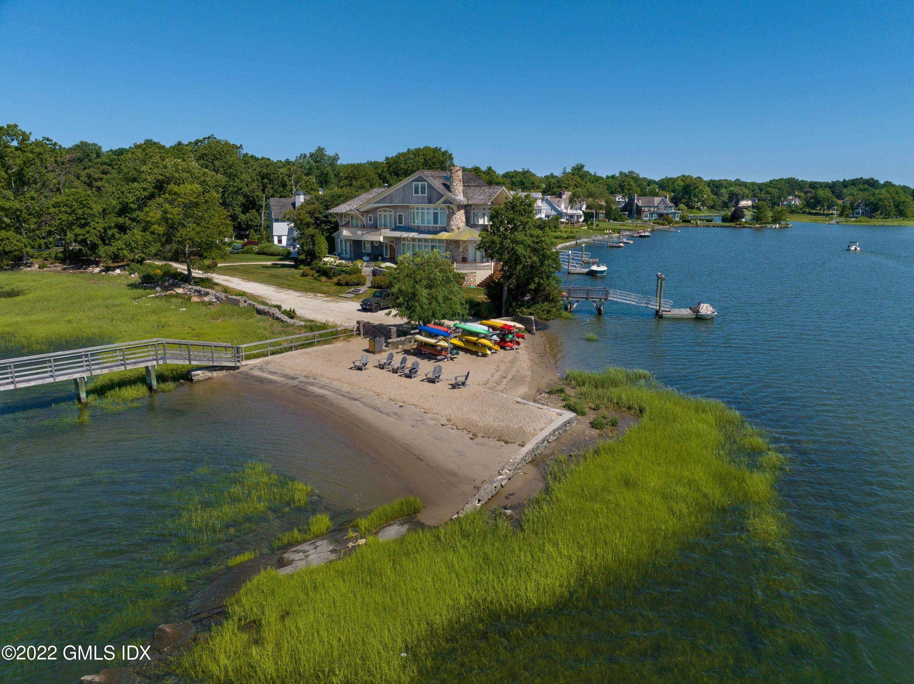 27 Willowmere Circle Riverside, CT 06878 - Photo 25 of 33 a view of a lake with a yard
