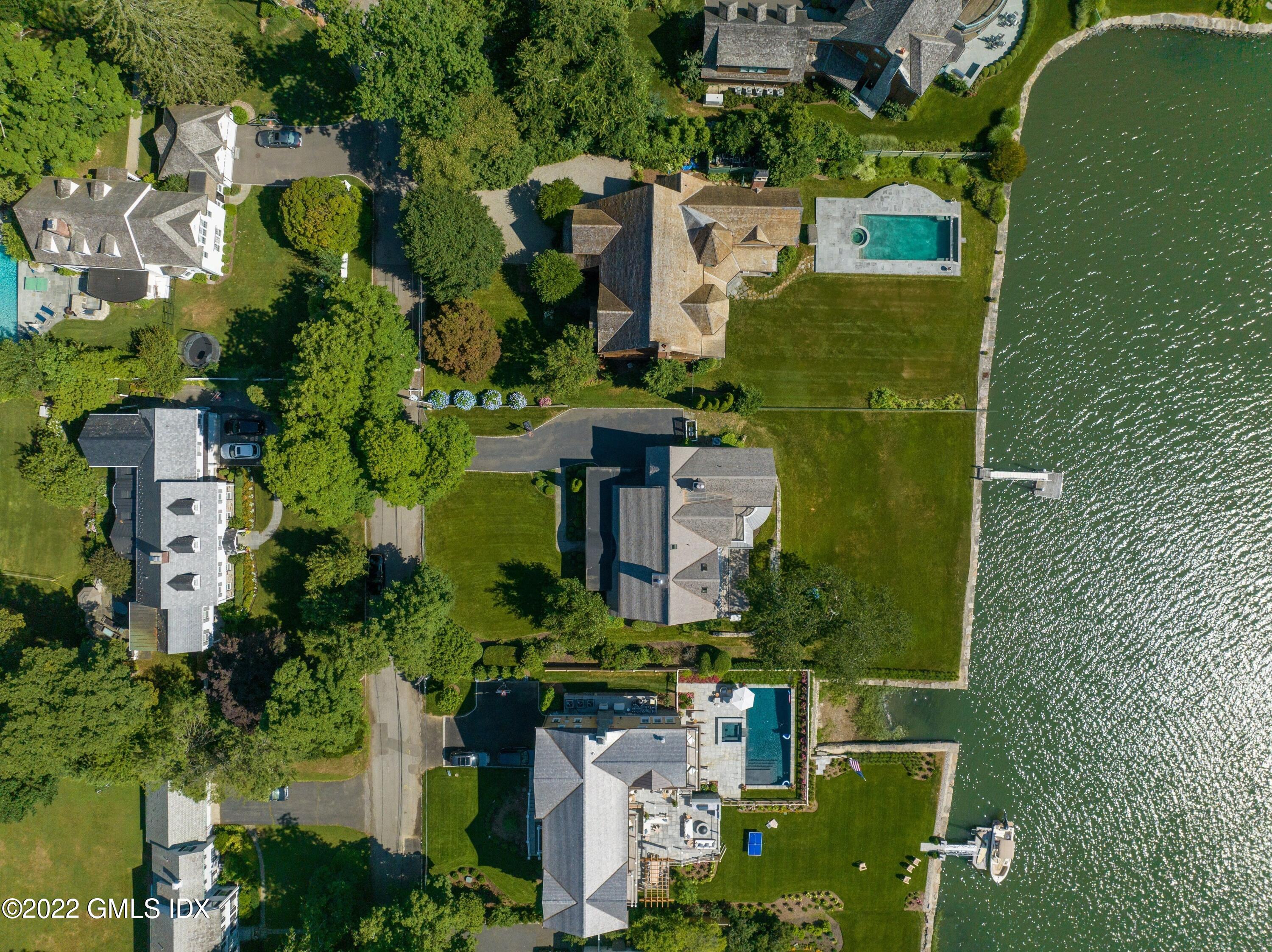 27 Willowmere Circle Riverside, CT 06878 - Photo 29 of 33 an aerial view of residential house with outdoor space and parking