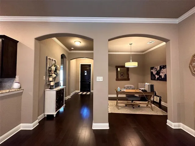 a view of a living room and dining room