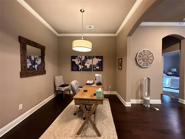 a room with furniture and wooden floor