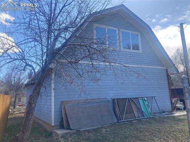 200 West Cheyenne Road Colorado Springs, CO 80906 - Photo 2 of 3 Garage workshop off back alley access