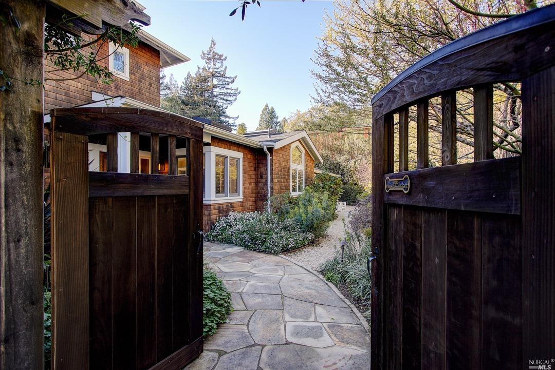 a view of a house with a small yard