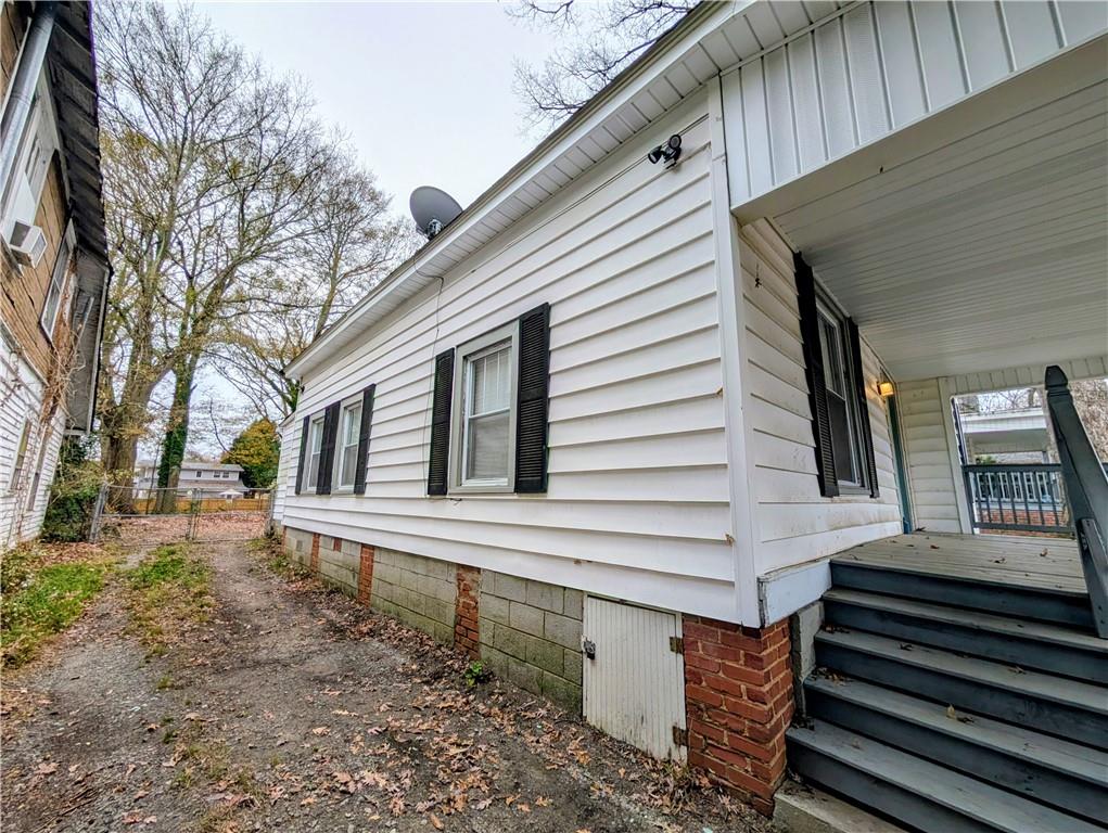 1716 Thompson Avenue Atlanta, GA 30344 - Photo 22 of 27 a view of a house with backyard and trees