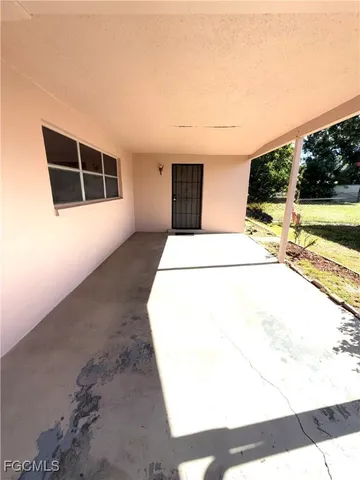 a house view with a backyard space