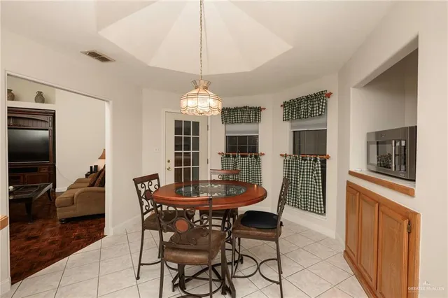 a view of a dining room with furniture