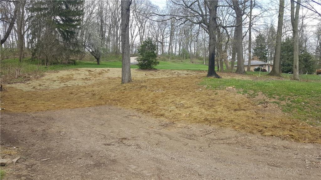 411 Jackson Road Plum, PA 15239 - Photo 1 of 7 Front street view. Driveway already there. Mature trees.