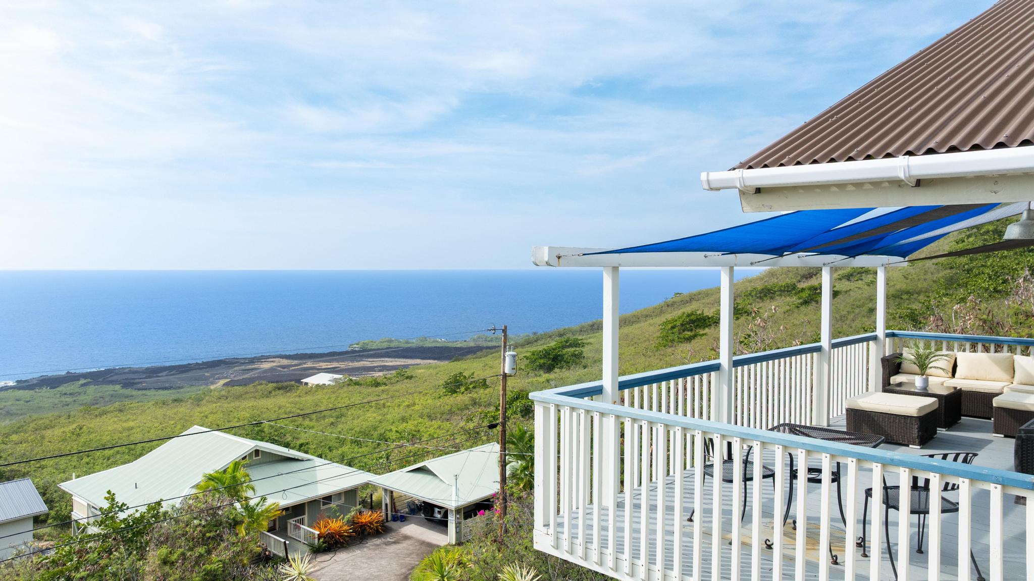 87-3210 Rd G Captain Cook, HI 96704 - Photo 4 of 22 a view of a terrace with a garden