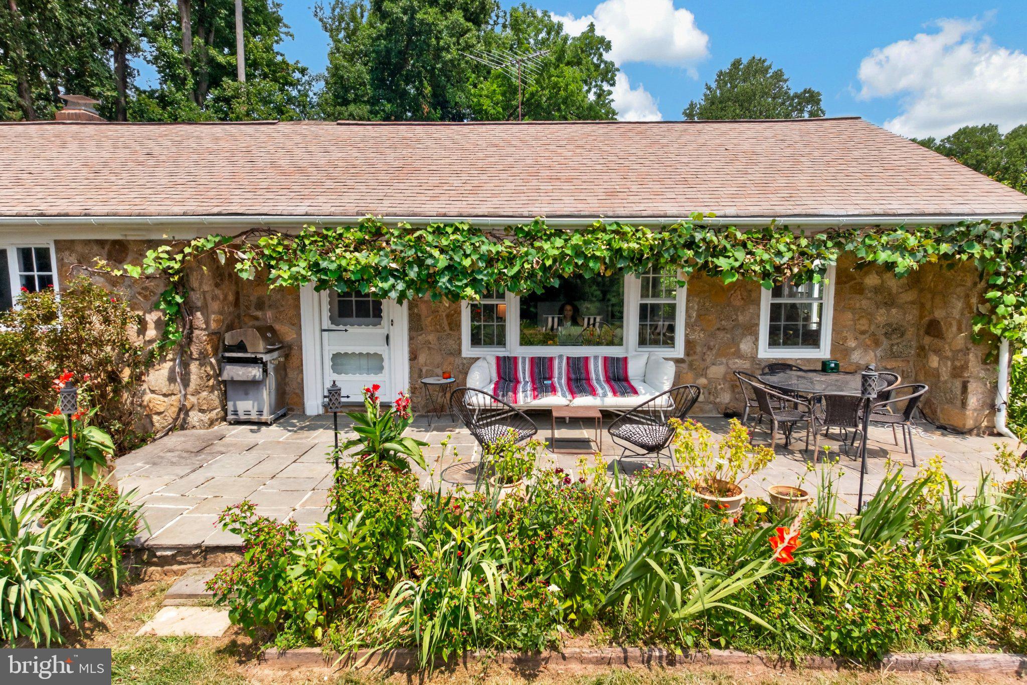 1015 Chester Springs Road Phoenixville, PA 19460 - Photo 52 of 68 Charming stone cottage with lush garden.
