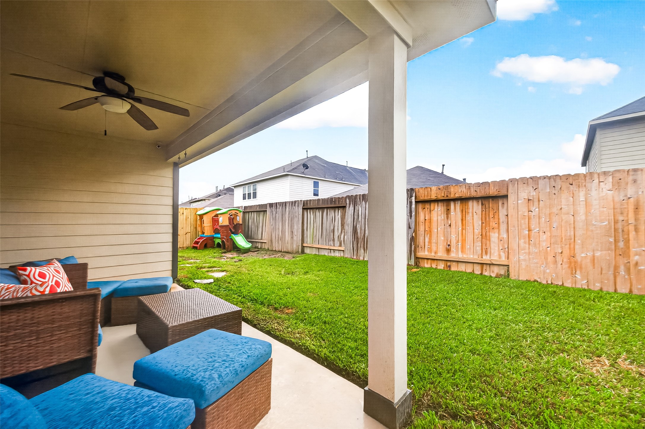 3155 View Valley Trail Katy, TX 77493 - Photo 45 of 50 Fantastic covered patio equipped with a ceiling fan, creating the perfect shade for outdoor relaxation
