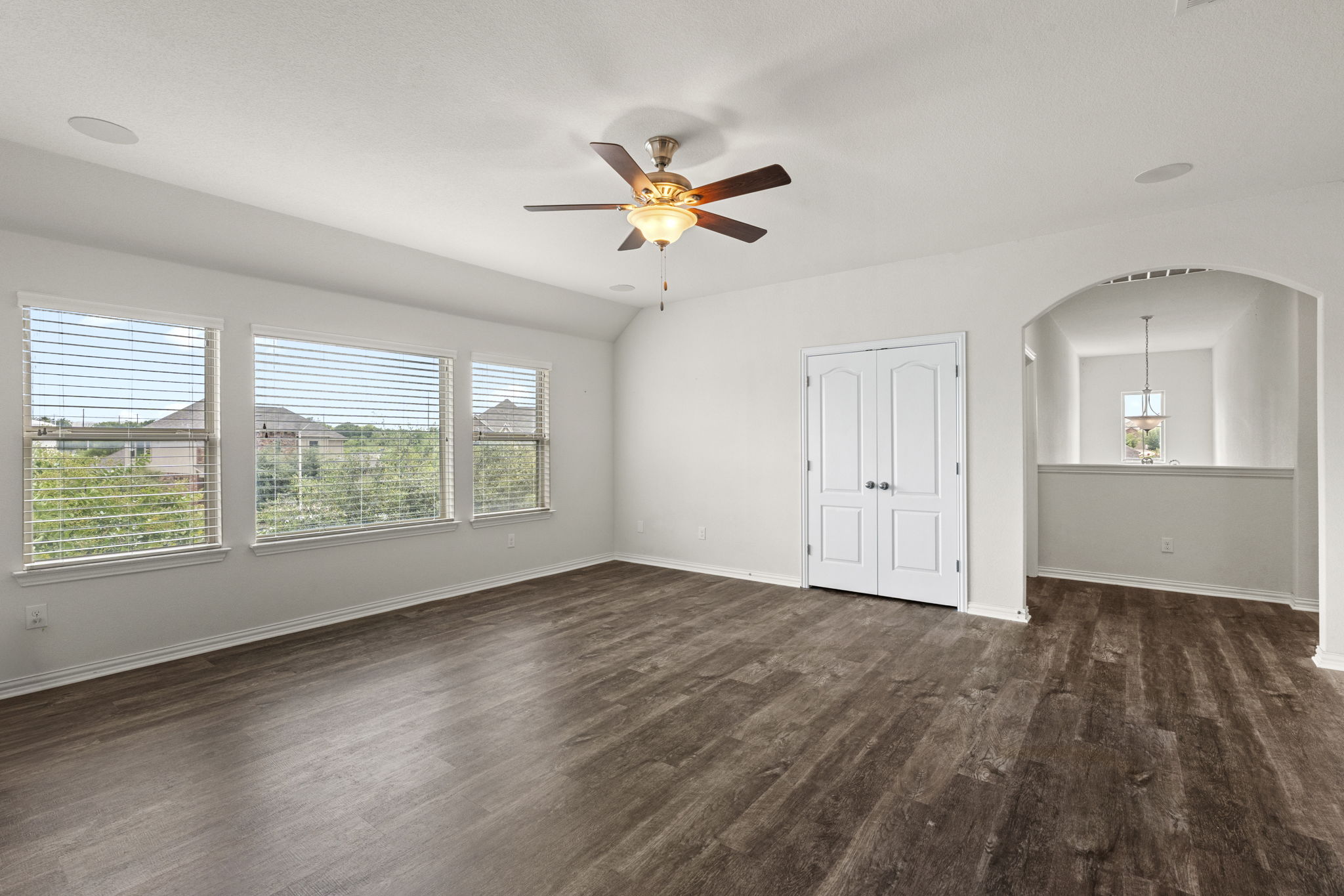 373 Rough Bark Street Buda, TX 78610 - Photo 18 of 39 Bonus living area on the second floor with high ceilings and built-in surround sound.